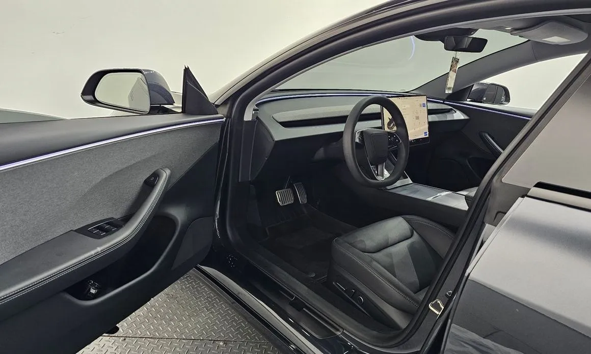 Tesla Model 3 — фото 8