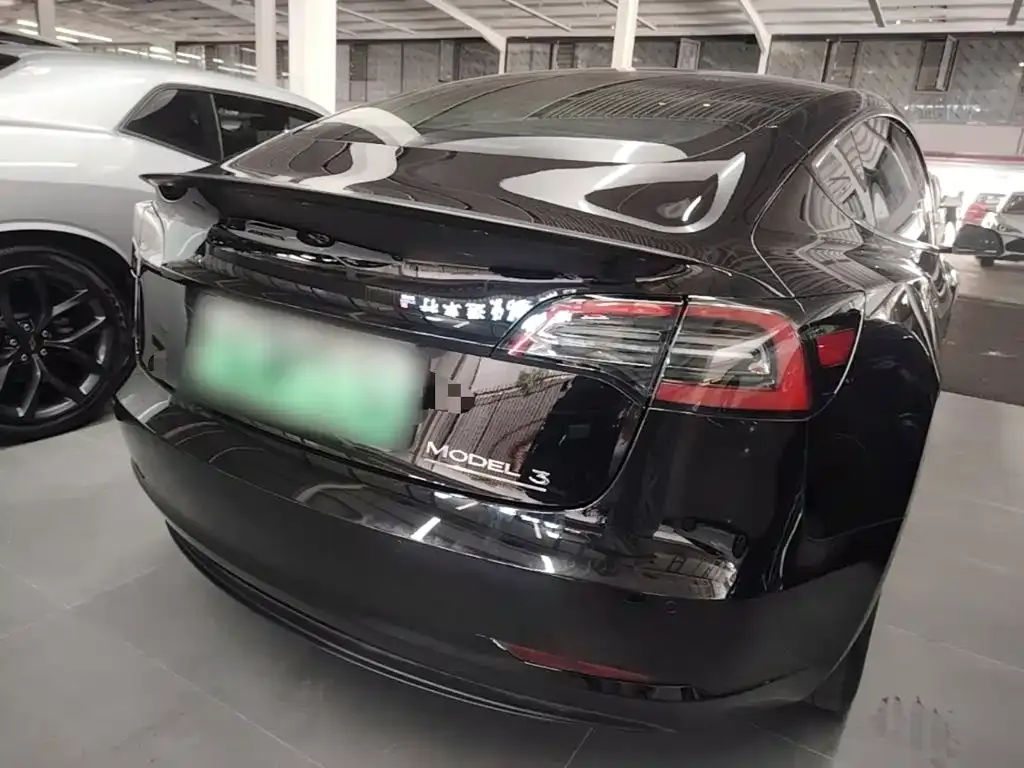 Tesla Model 3 — фото 5