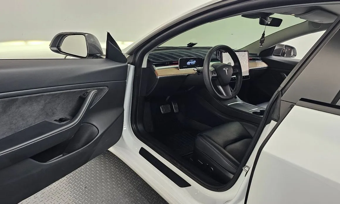 Tesla Model 3 — фото 10
