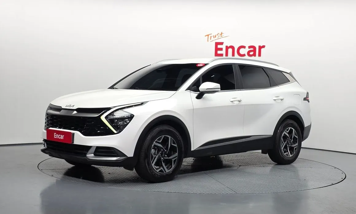 Kia Sportage — фото 1