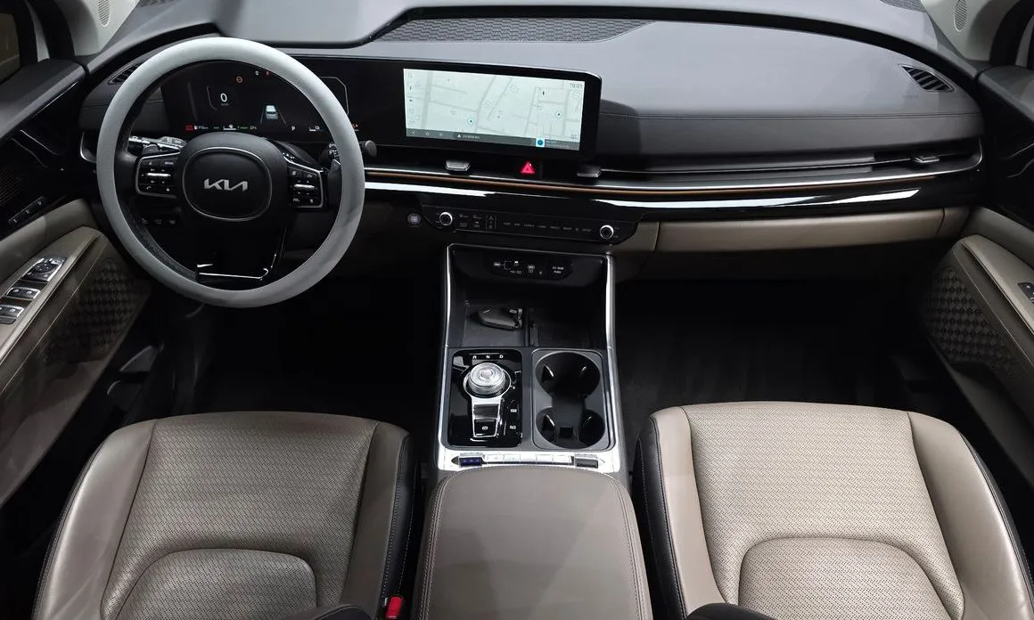 Kia Carnival — фото 10