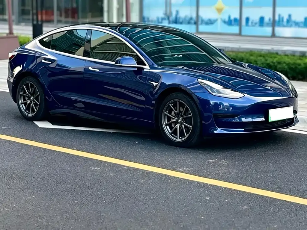 Tesla Model 3 — фото 7