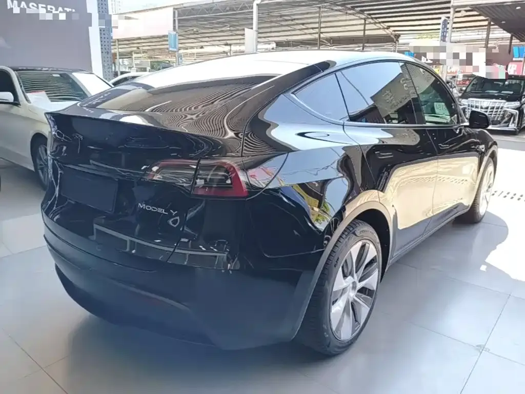 Tesla Model Y — фото 7