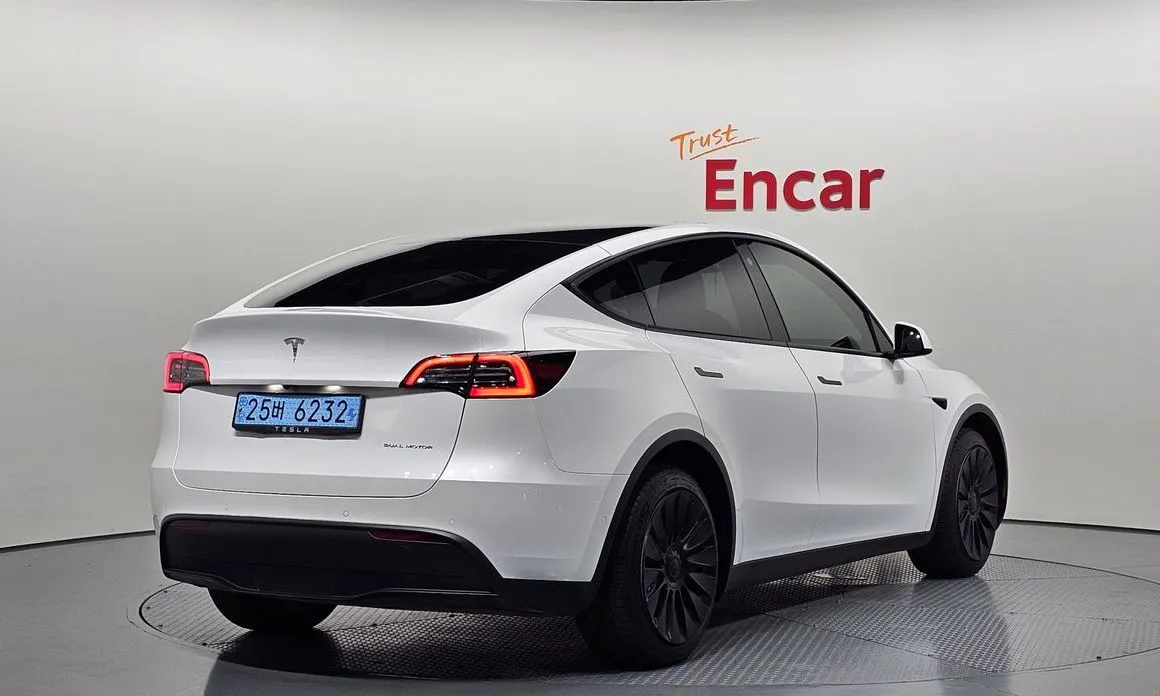 Tesla Model Y — фото 7