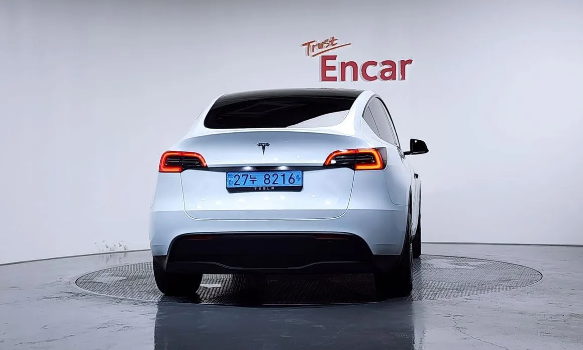 Tesla Model Y — фото 5
