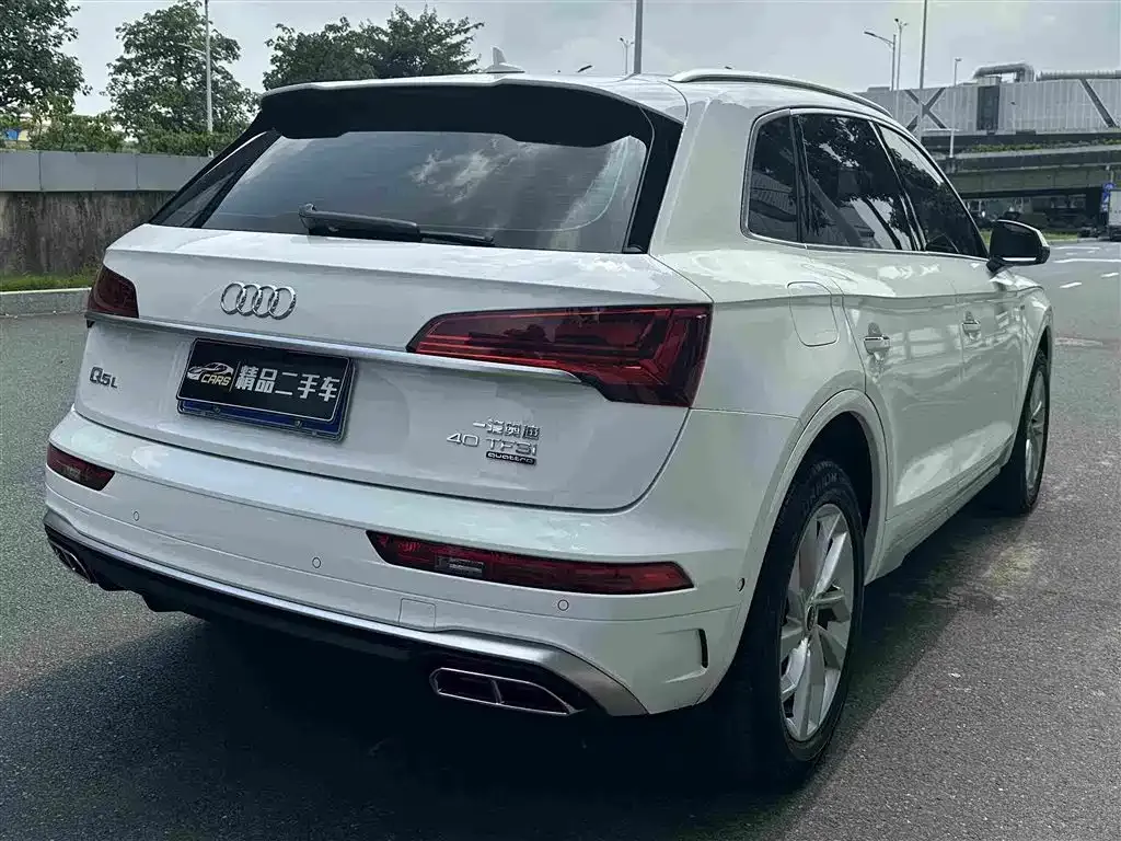 Audi Q5L — фото 7