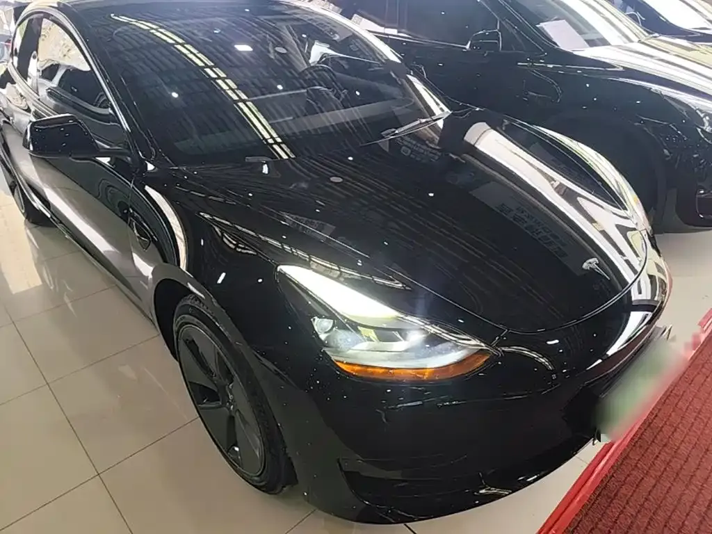 Tesla Model 3 — фото 7