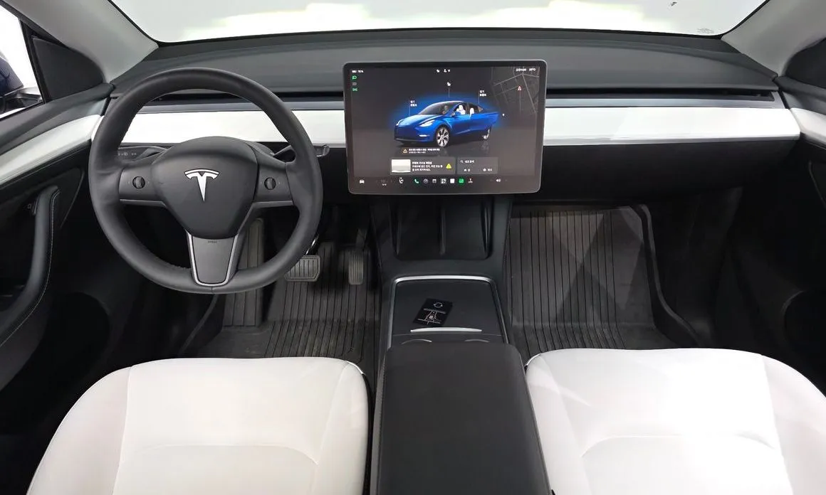 Tesla Model Y — фото 7
