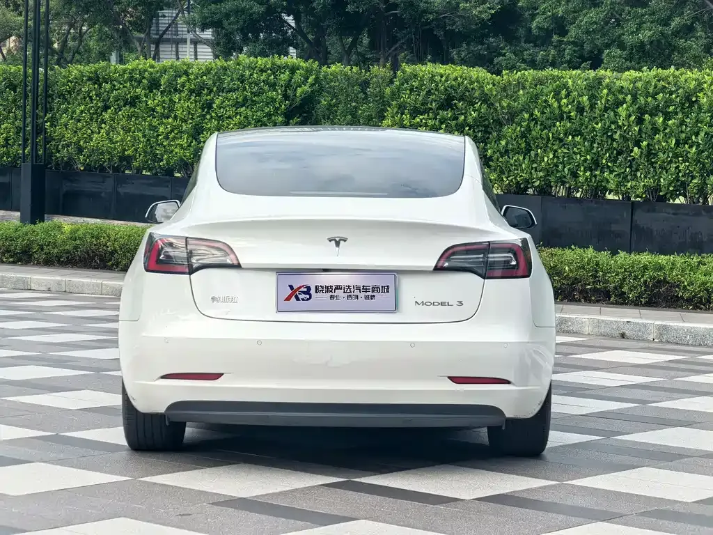 Tesla Model 3 — фото 10