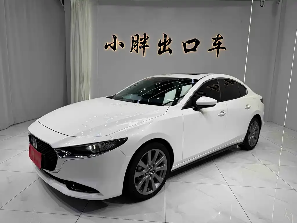 Mazda 3 Axela — фото 1