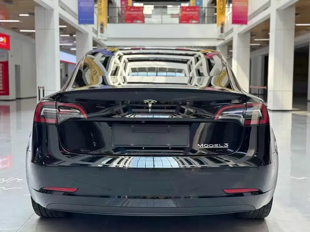 Tesla Model 3 — фото 7