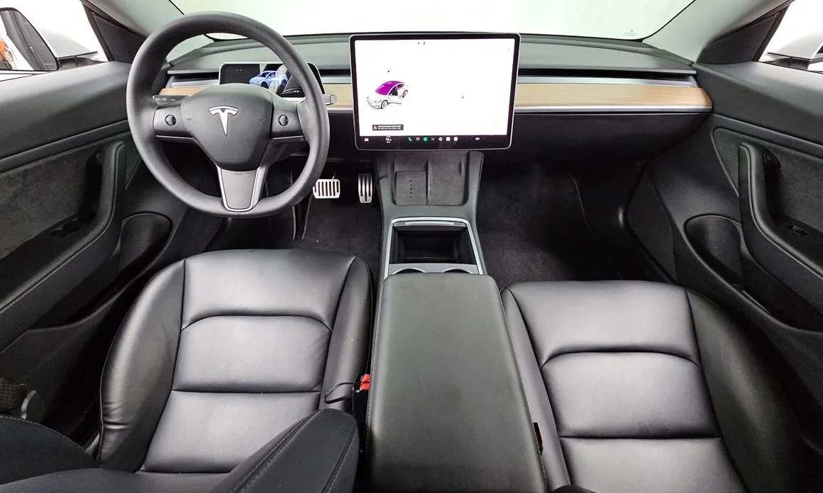 Tesla Model 3 — фото 7