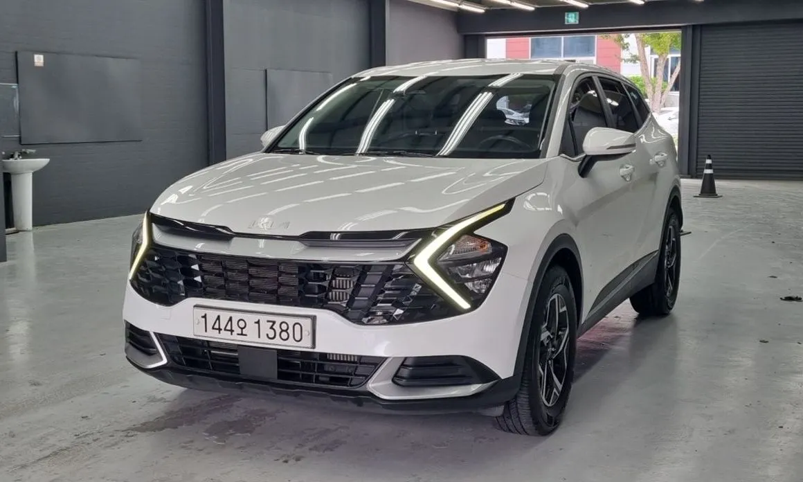 Kia Sportage — фото 1