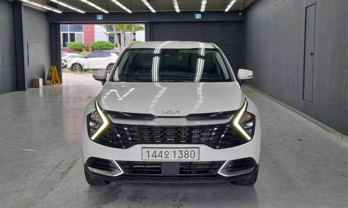 Kia Sportage — фото 10