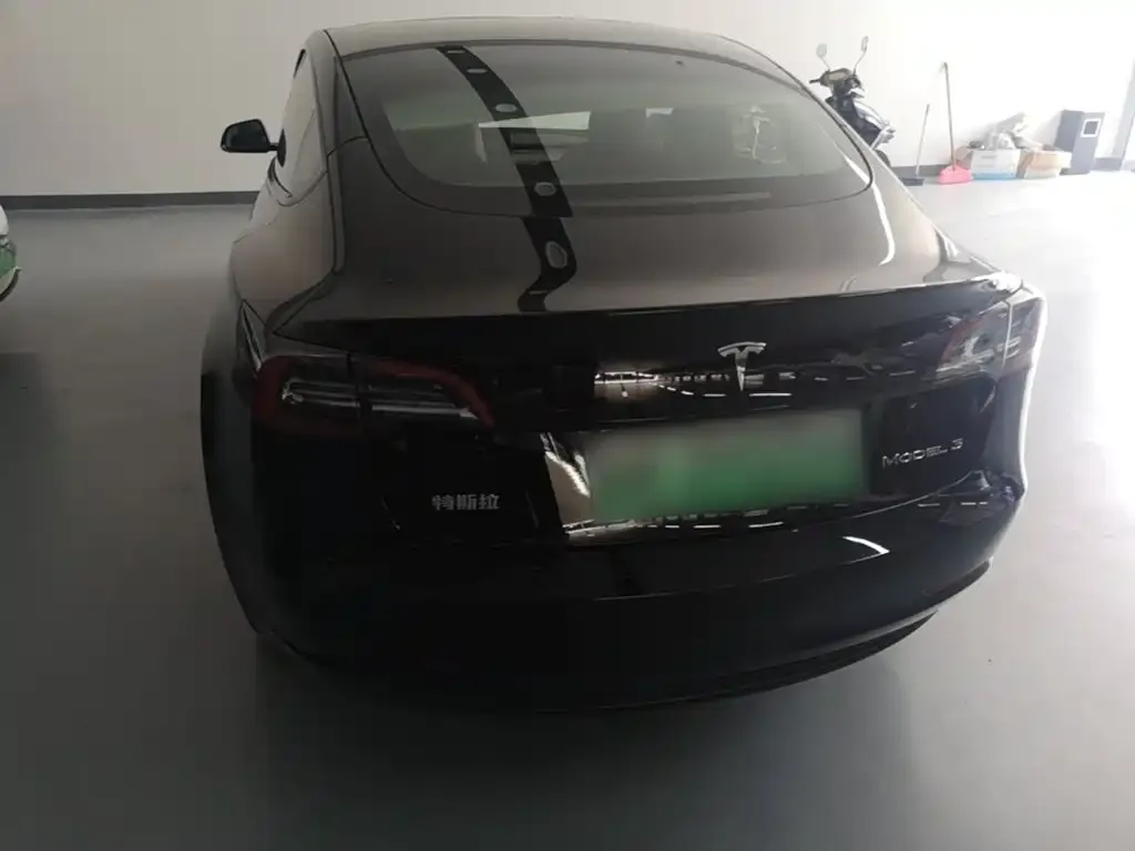 Tesla Model 3 — фото 4