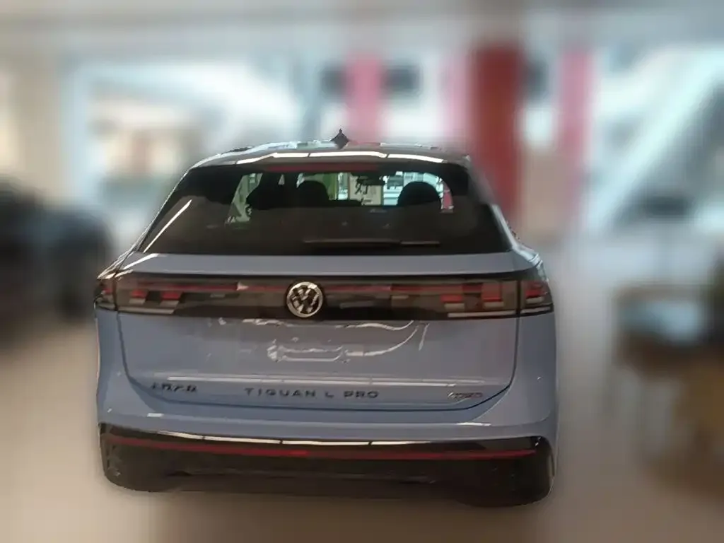Volkswagen Tiguan L — фото 4