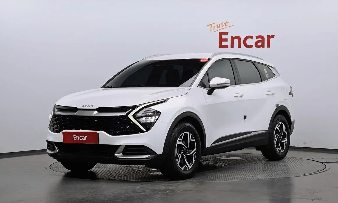 Kia Sportage — фото 1
