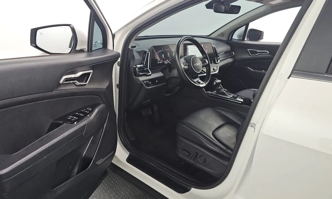 Kia Sportage — фото 8