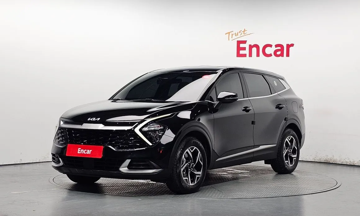 Kia Sportage — фото 1