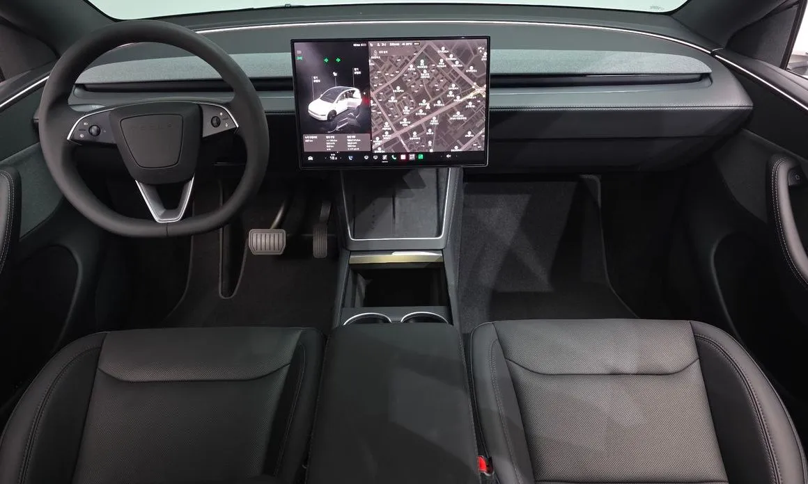 Tesla Model Y — фото 8