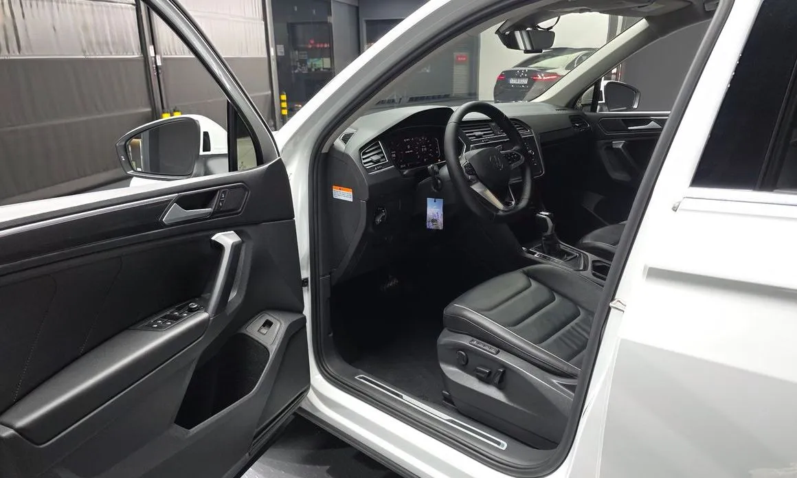 Volkswagen Tiguan — фото 8