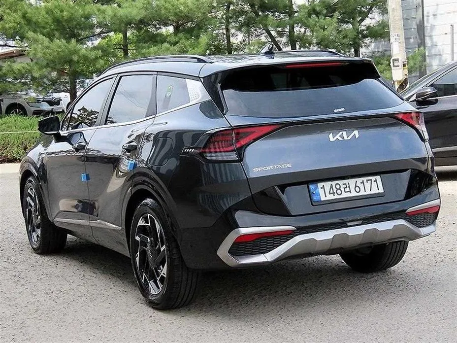 Kia Sportage — фото 10