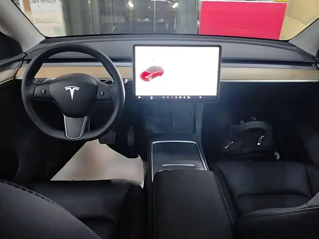 Tesla Model Y — фото 7