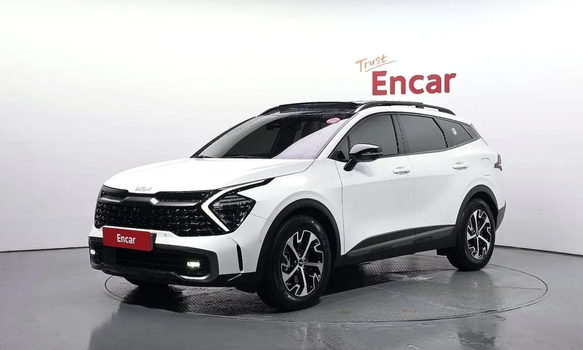 Kia Sportage — фото 1