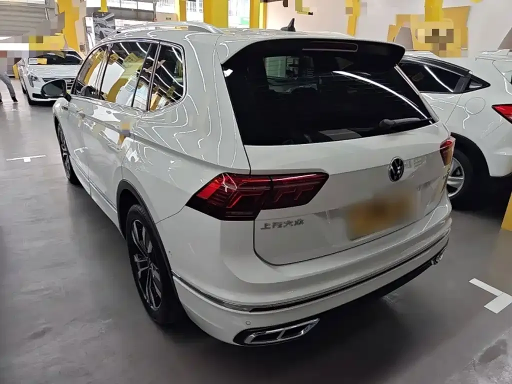 Volkswagen Tiguan L — фото 8