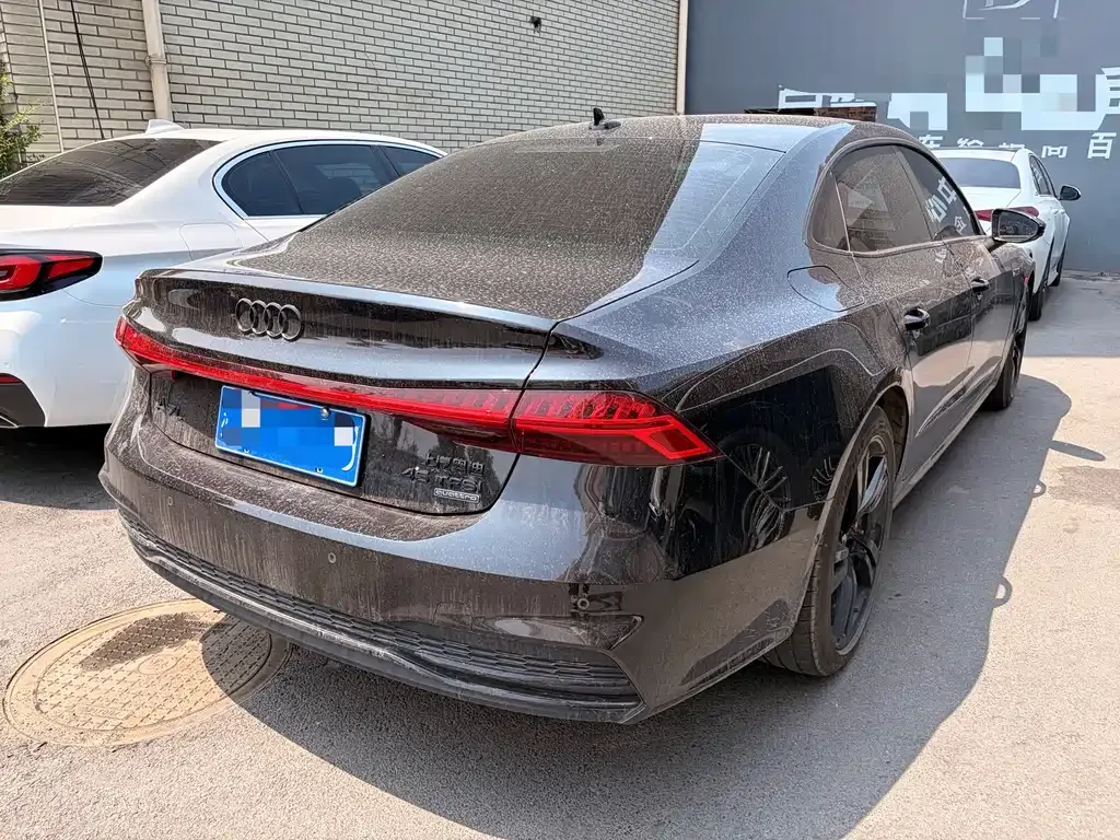 Audi A7L — фото 7