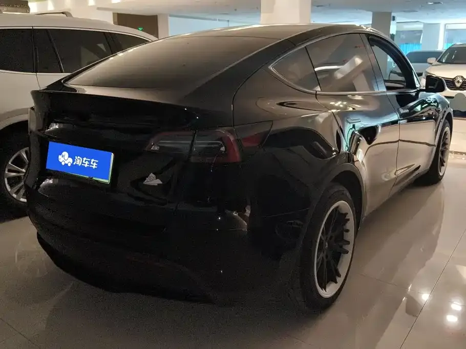 Tesla Model Y — фото 8