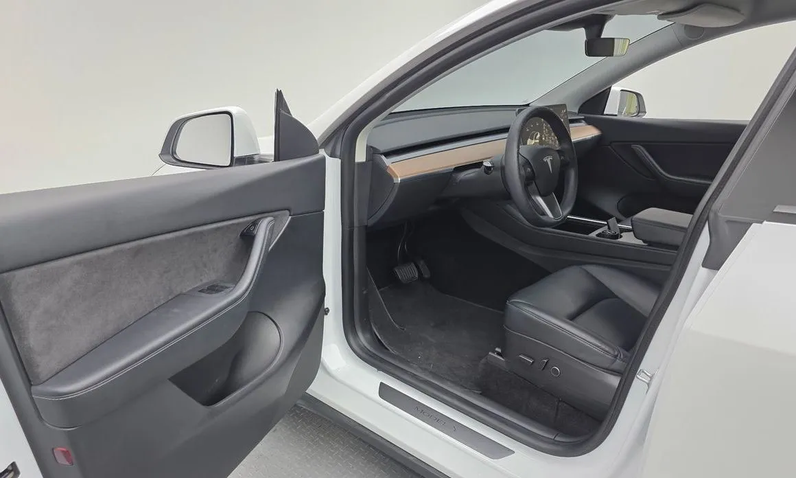 Tesla Model Y — фото 9