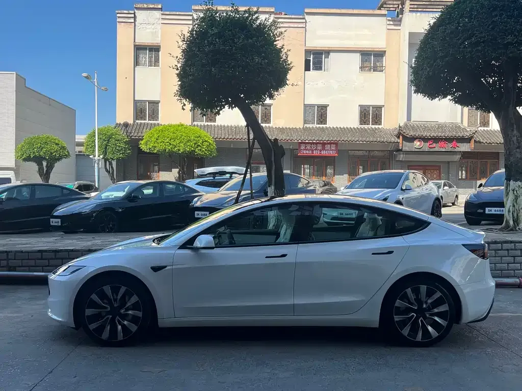 Tesla Model 3 — фото 6