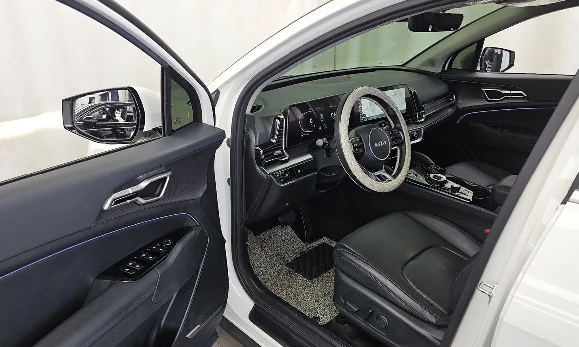 Kia Sportage — фото 9