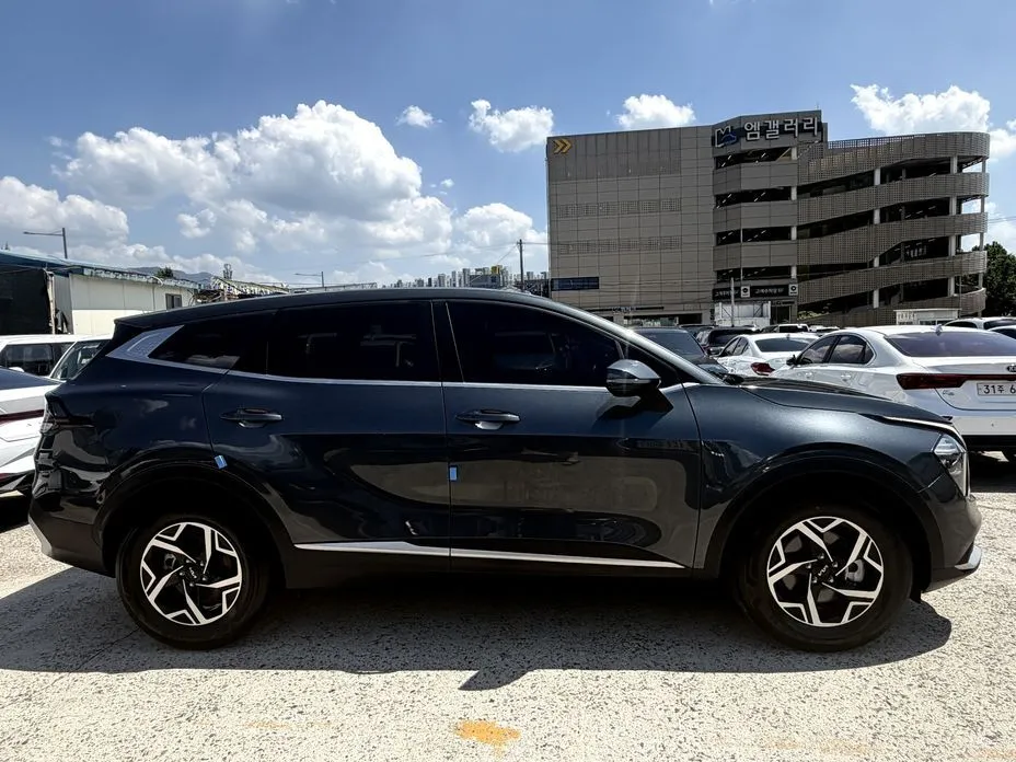 Kia Sportage — фото 10