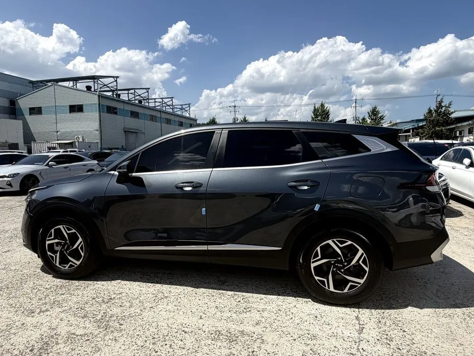 Kia Sportage — фото 8