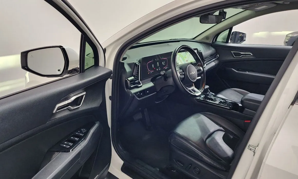 Kia Sportage — фото 10