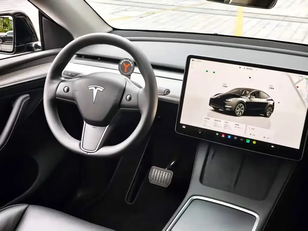 Tesla Model Y — фото 7