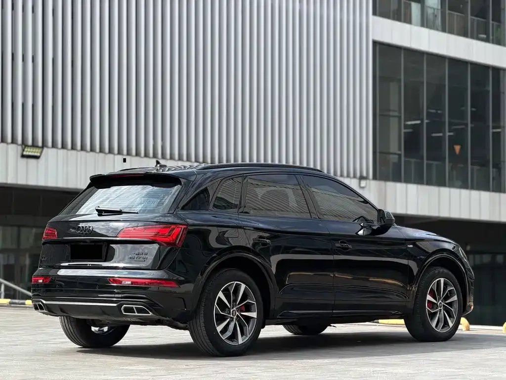 Audi Q5L — фото 7