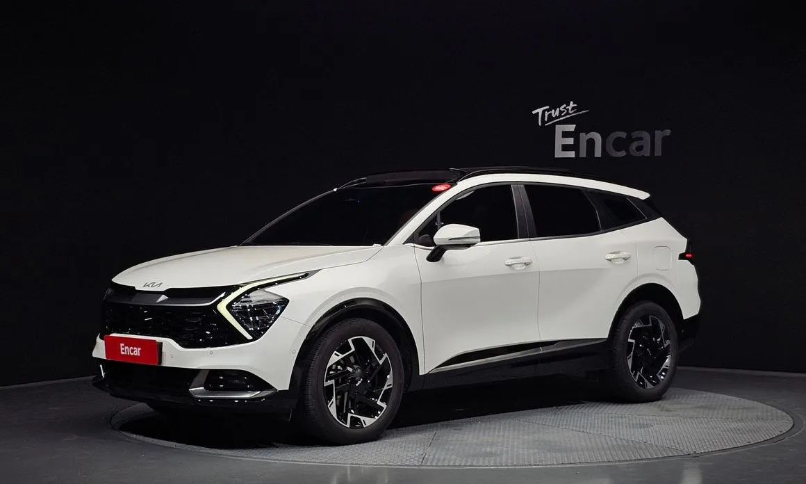 Kia Sportage — фото 1