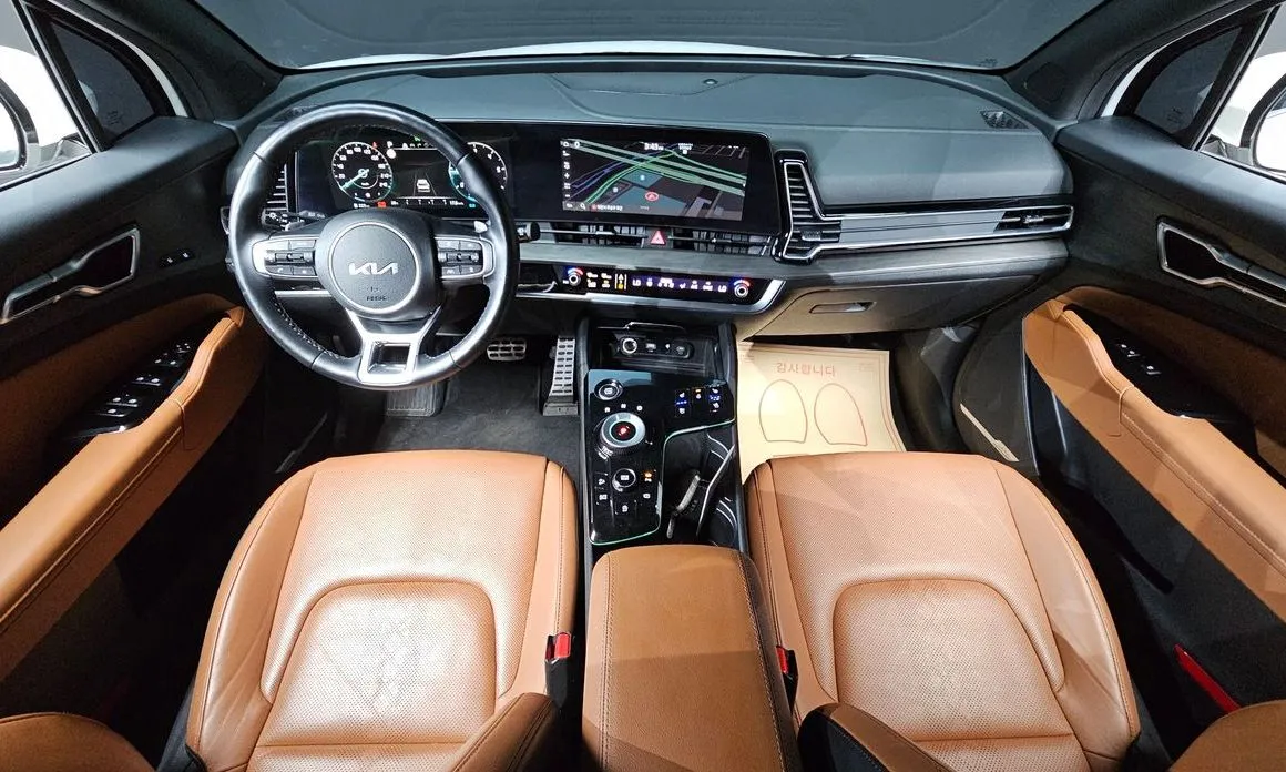 Kia Sportage — фото 10