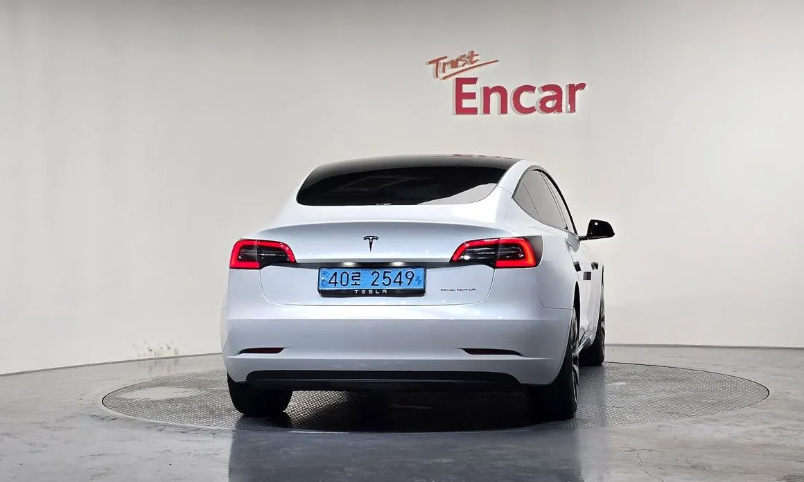 Tesla Model 3 — фото 7