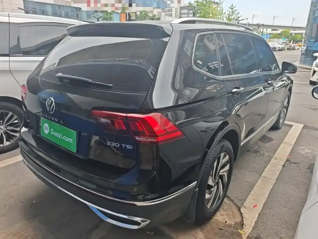 Volkswagen Tiguan L — фото 2