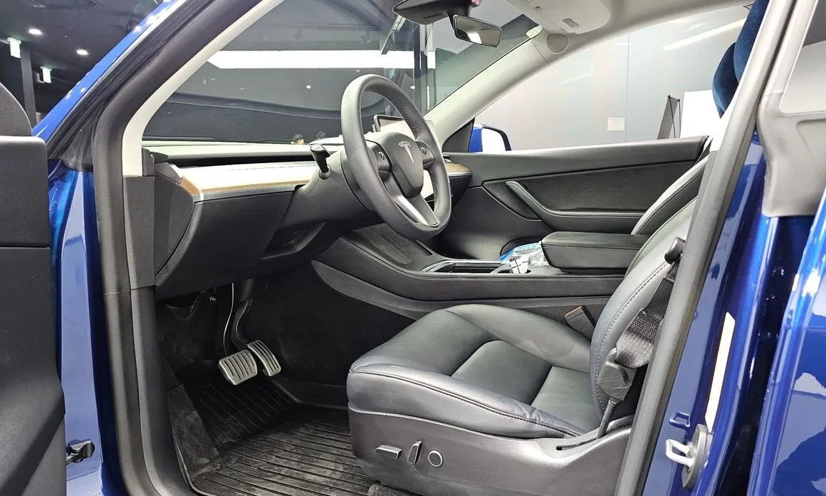 Tesla Model Y — фото 10