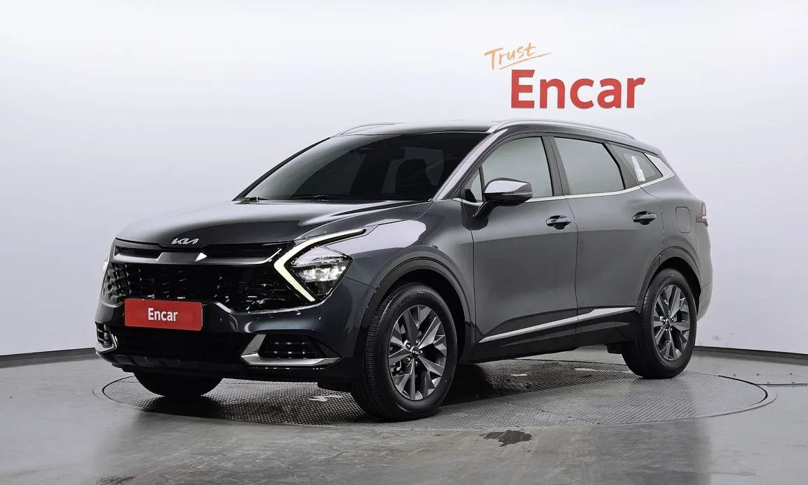 Kia Sportage — фото 1