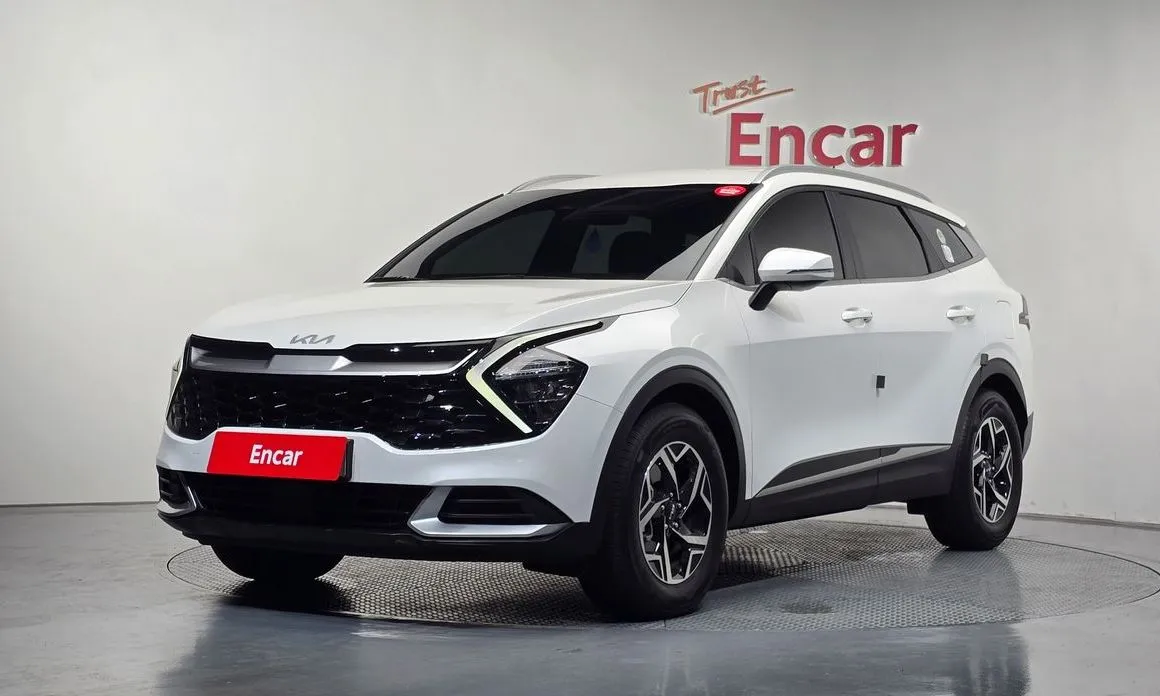 Kia Sportage — фото 1