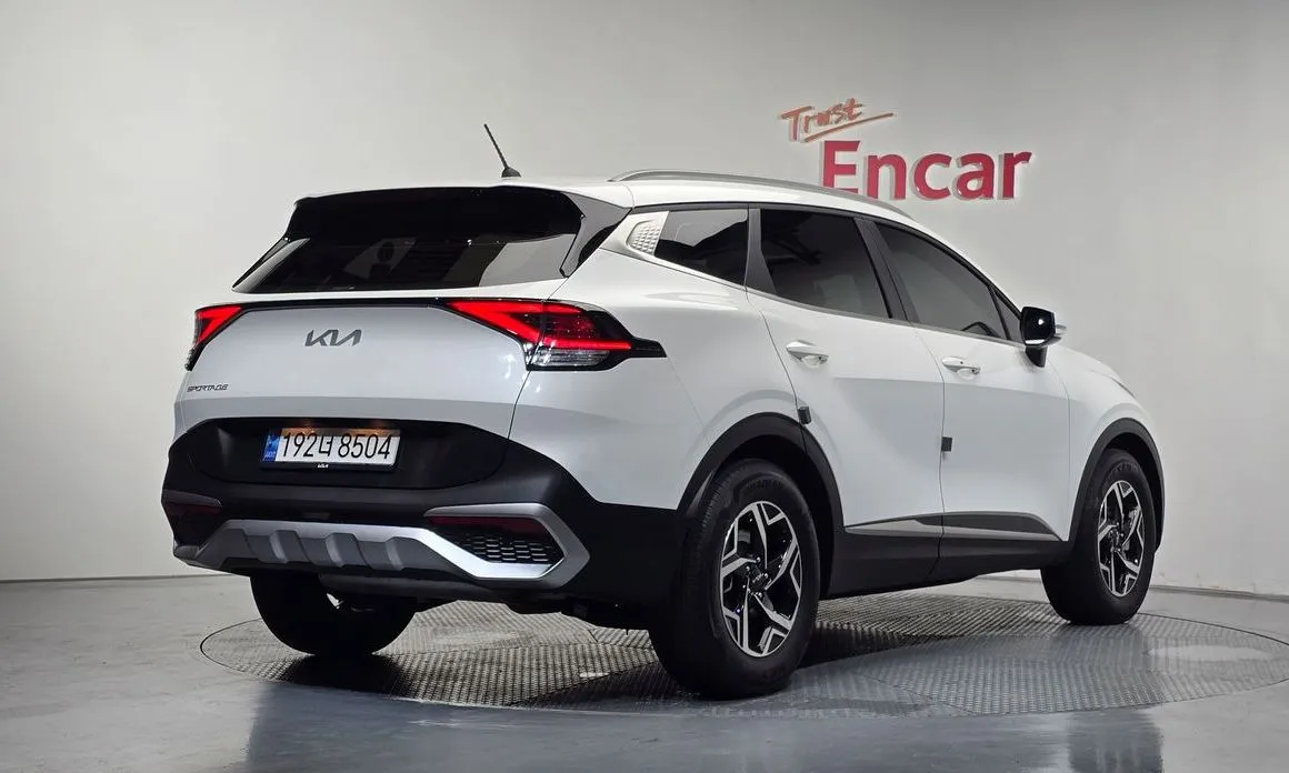 Kia Sportage — фото 8