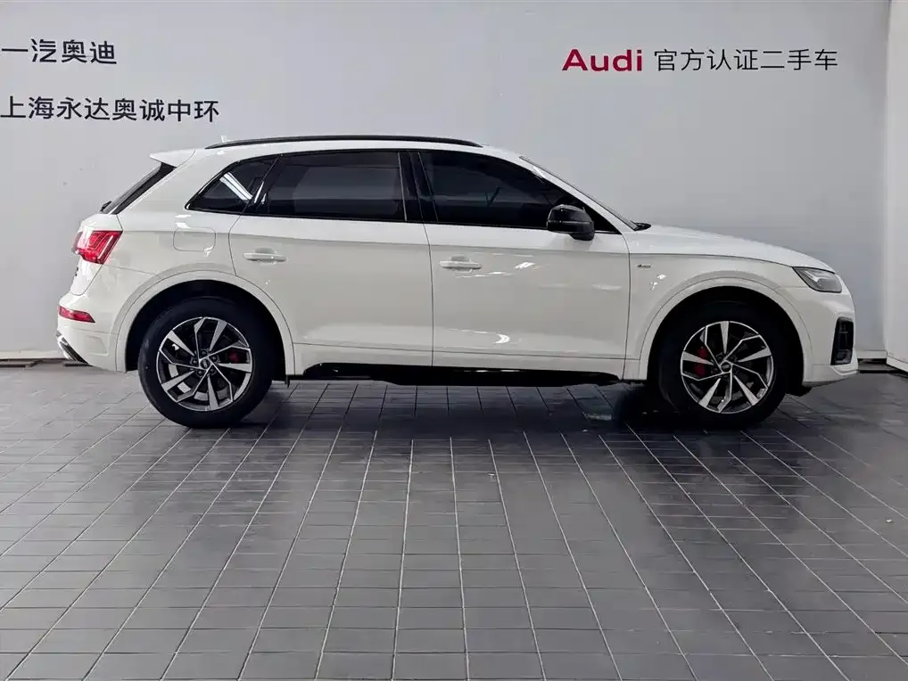 Audi Q5L — фото 10