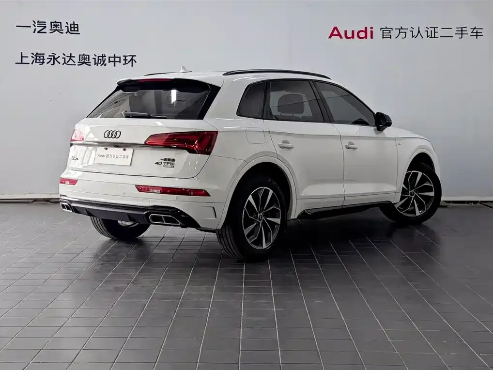 Audi Q5L — фото 8