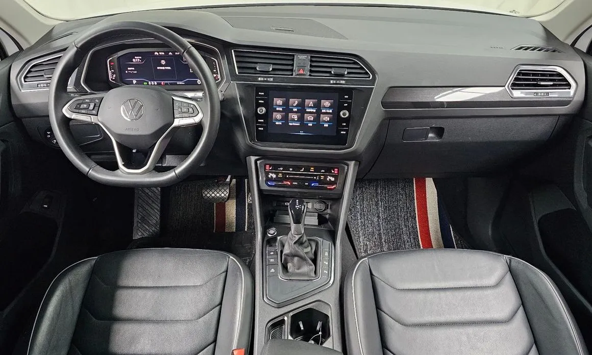 Volkswagen Tiguan — фото 10